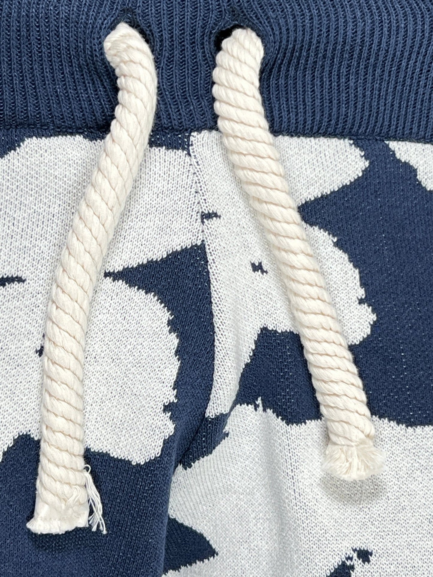 Close-up of a navy blue and white FAMILY FIRST JOSS2403 JOGGER SHORT JACQUARD DB with a camouflage pattern and drawstrings, made in Italy.