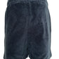 A pair of Family First JOSS2504 Jogger Short Track in dark blue fleece is displayed from the back on a plain white background, featuring an elastic waistband.
