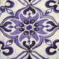 Close-up of the Family First SHS2504 Shirt Amalfi Multicolor by FAMILY FIRST, showcasing an intricate multicolor abstract floral design with purple and black paisley on a light background, expertly crafted from luxurious Ramie fabric.