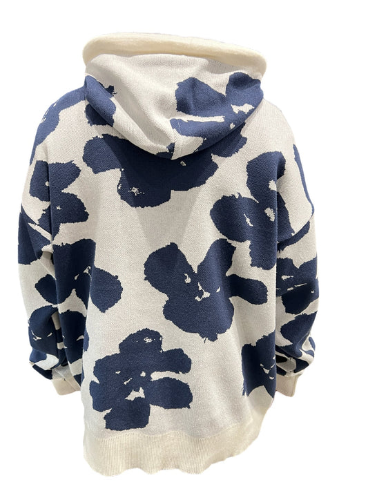 A FAMILY FIRST SWS2405 hoodie with a cream-colored print and a navy blue abstract floral pattern displayed on a mannequin against a black background.