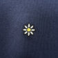 The Family First T2502DB T-shirt Flower Dark Blue by FAMILY FIRST features a charming embroidered daisy design on dark ribbed fabric, with white petals and a yellow center.