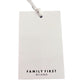 Clothing tag featuring "FAMILY FIRST" printed in black, highlighting a 100% cotton Family First TS2416 T-Shirt College Black.