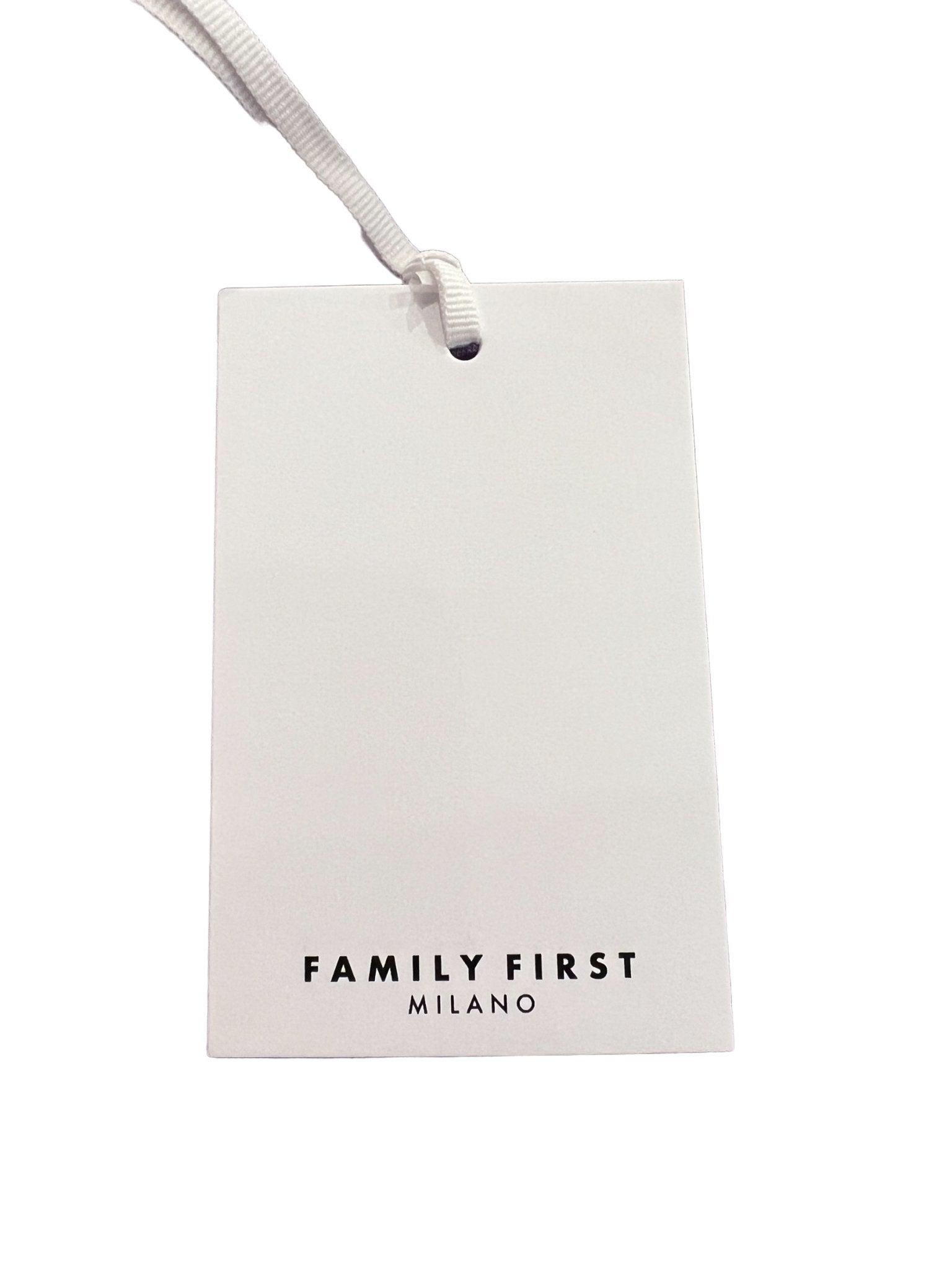 Clothing tag featuring "FAMILY FIRST" printed in black, highlighting a 100% cotton Family First TS2416 T-Shirt College Black.