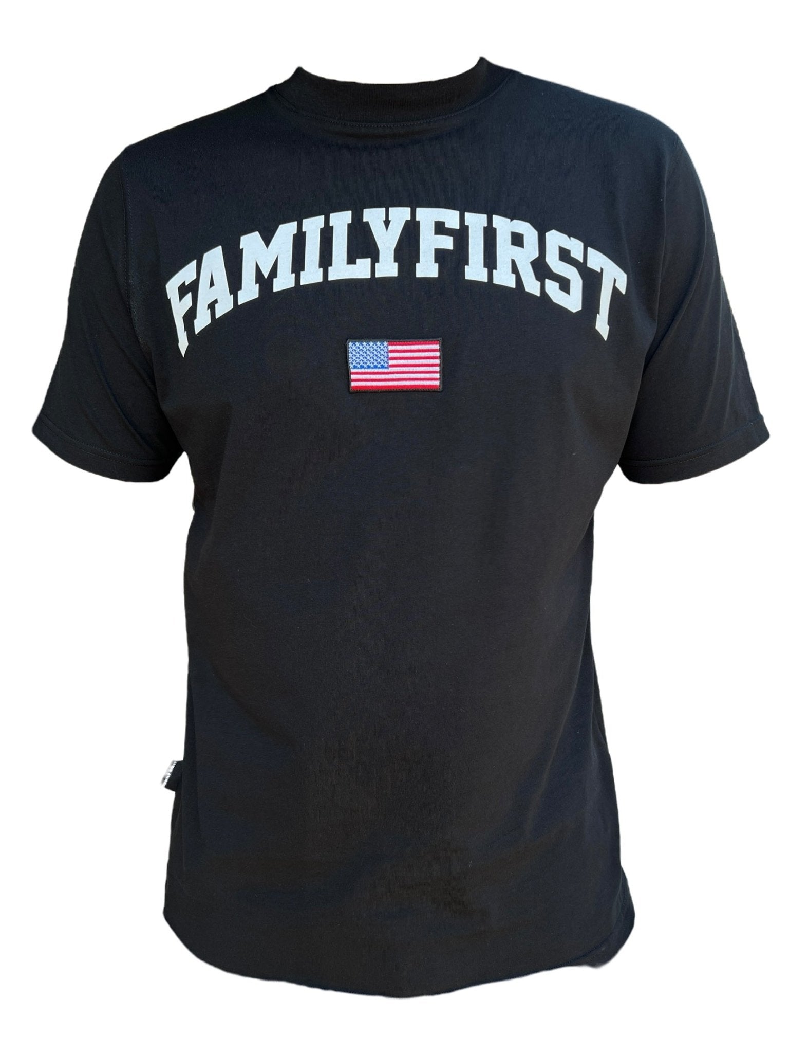 The Family First TS2416 T-Shirt College Black by FAMILY FIRST is made from 100% cotton and prominently displays "Family First" in large white letters above a small American flag emblem.