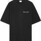 The Filling Pieces Chrome Flower T-shirt Black by FILLING PIECES is an organic cotton tee featuring small white "Filling Pieces" text on the left chest.