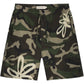 The Filling Pieces Flower Shorts Camo by FILLING PIECES feature a green camouflage print, drawstring waist, and white abstract flower designs on the left leg and right side—a modern twist on classic camo shorts.