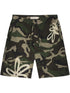 The Filling Pieces Flower Shorts Camo by FILLING PIECES feature a green camouflage print, drawstring waist, and white abstract flower designs on the left leg and right side—a modern twist on classic camo shorts.