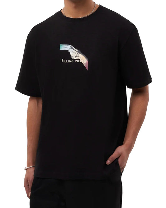 A man in a black Filling Pieces Gradient Handshake Tee featuring a colorful abstract logo on the chest.