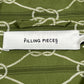 The Filling Pieces Resort Monogram Shirt Olive is made from 100% organic cotton, featuring an olive green fabric with an all-over rope pattern and a white label displaying "FILLING PIECES" in black text.