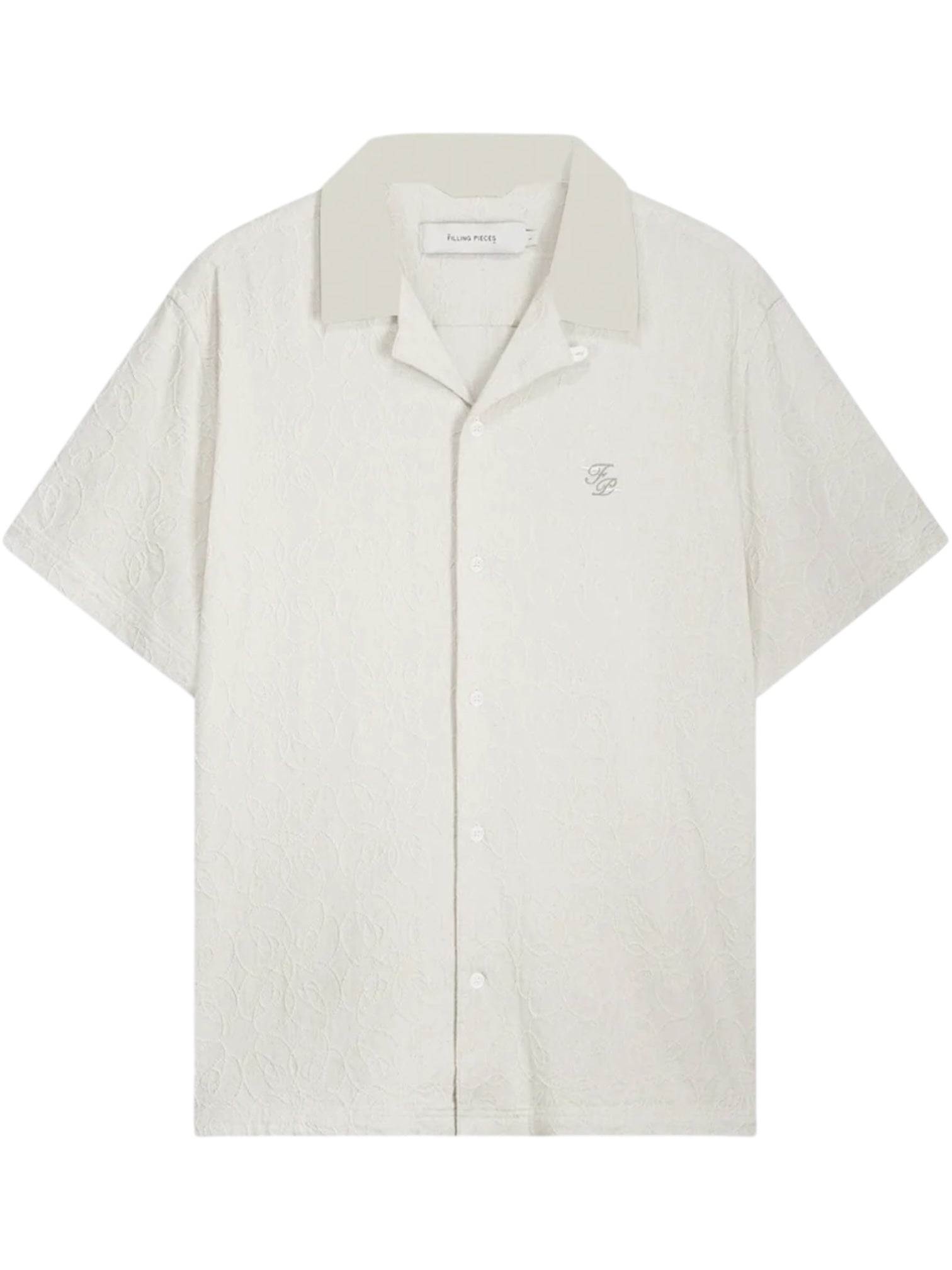The Filling Pieces Resort Shirt Petal by FILLING PIECES is a short-sleeved, off-white linen-viscose blend shirt with a subtle texture, notched collar, and small floral embroidery logo on the left chest.