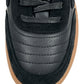Close-up of a FLANEUR TIVOLI RUNNER BLACK sneaker, featuring a textured black calfskin leather upper, black laces, stitched detailing, and a gum rubber sole.