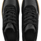 The FLANEUR Flaneur Tivoli Runner Black features sustainable black uppers, gum soles, and detailed laces and stitching, seen from above.