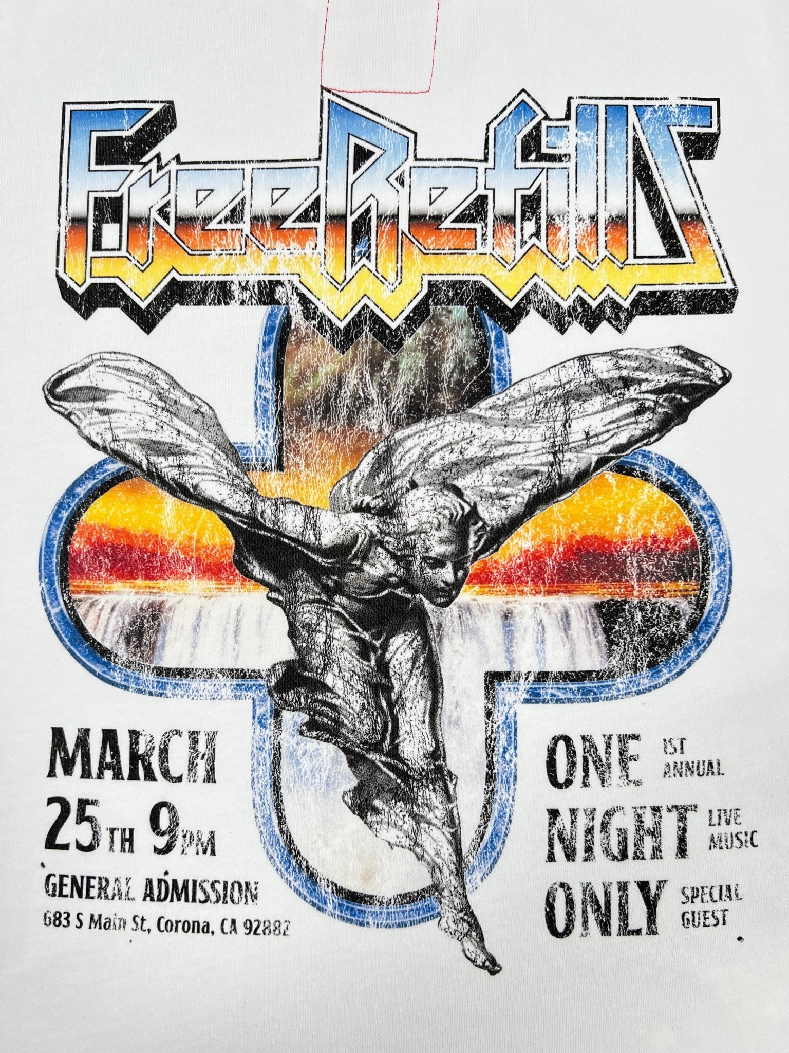 Concert poster for "Free Refills" with a winged statue—March 25, 9pm, Corona, CA. One night only with live music and special guest! Grab your exclusive FREE REFILLS Showcase Tee (FR-C3-7) White at the event.