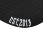 Close-up of the GODSPEED Godspeed GS Forever Trucker Gradient Hat Hawaiian, a limited edition black hat with white "EST. 2013" embroidery.