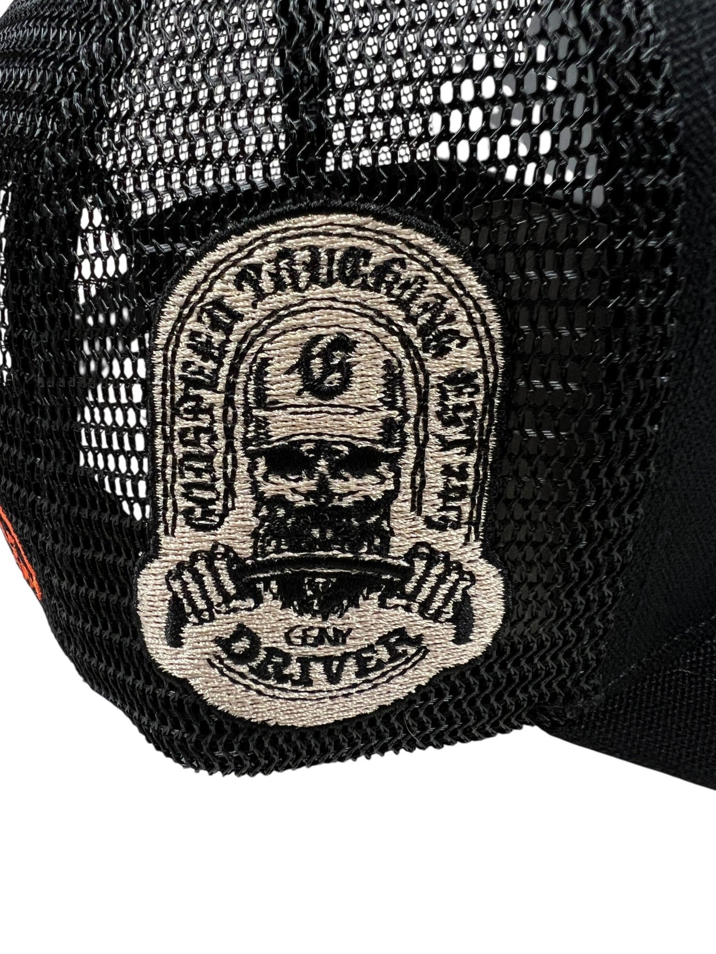 The Godspeed GS Forever Trucker Gradient Hat Hawaiian by GODSPEED is a black mesh trucker hat featuring an embroidered skull in a helmet with "GEN DRIVER" text, making this limited edition piece a bold statement accessory.