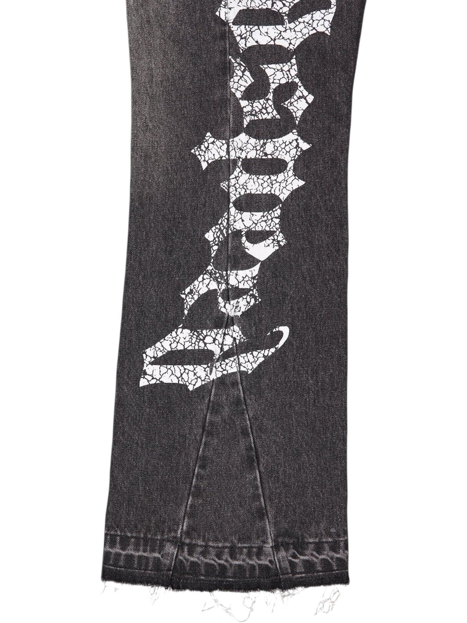 A close-up of the GODSPEED Godspeed OG Logo Flared Denim Grey Wash showcases its flared grey denim leg, large white cracked-text graphic, and raw unfinished hem.