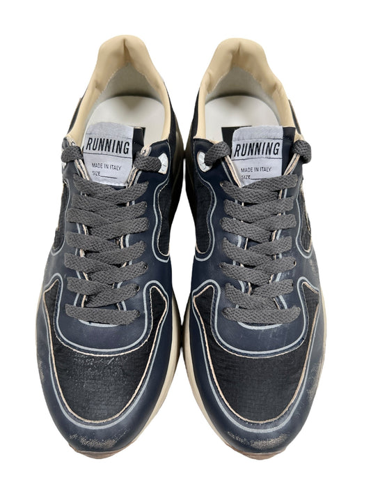 A pair of GOLDEN GOOSE GMF00126 running sneakers in dark blue, black, silver, and white with a RUNNING SOLE, labeled "Running," crafted in Italy and indicating their size on the tongue.