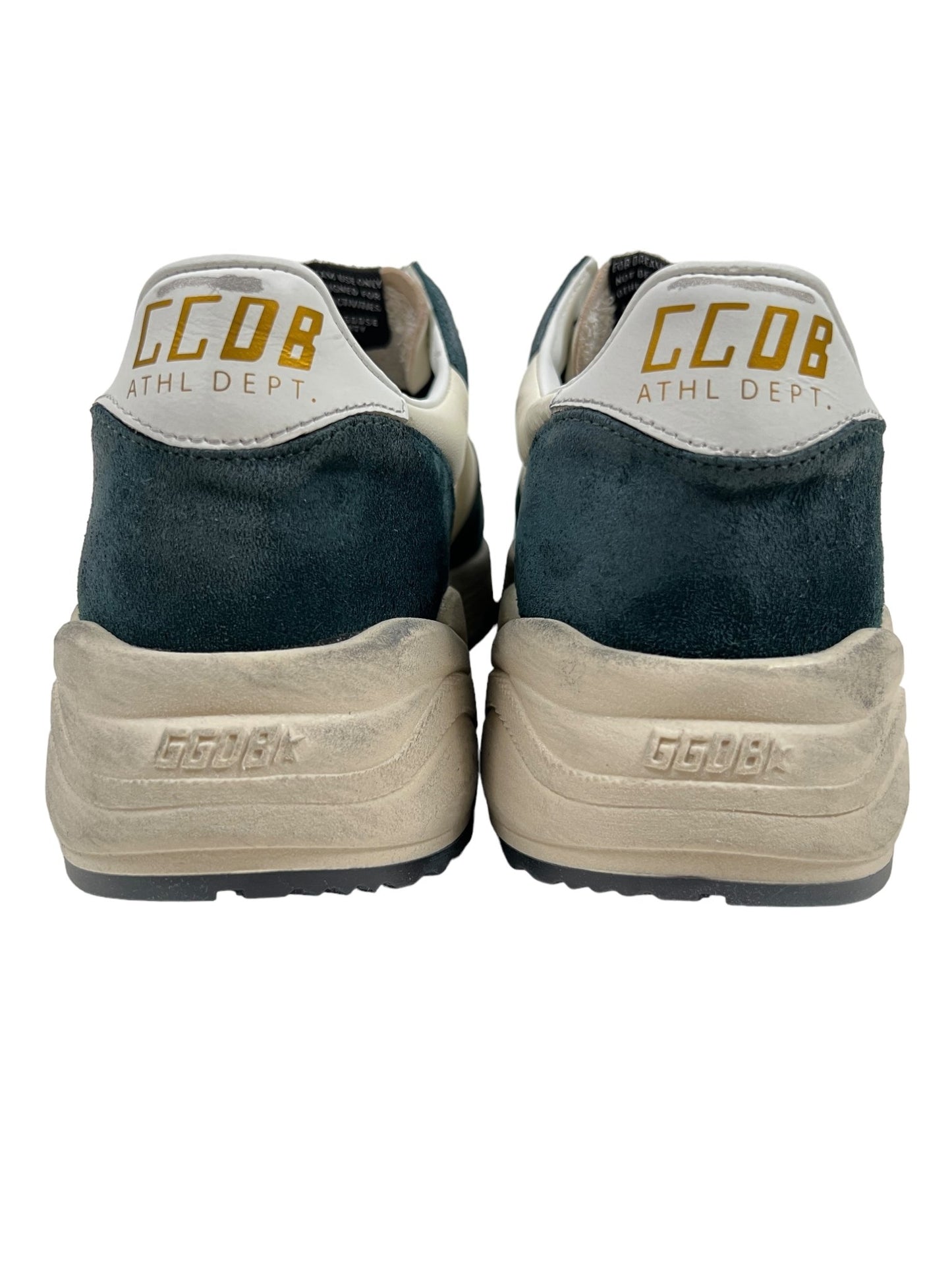 Rear view of a pair of GOLDEN GOOSE GMF00126 RUNNING SOLE sneakers in dark green and white suede, featuring "GCOD ATHL DEPT." on the heel, reminiscent of the Golden Goose style. The soles show some wear.