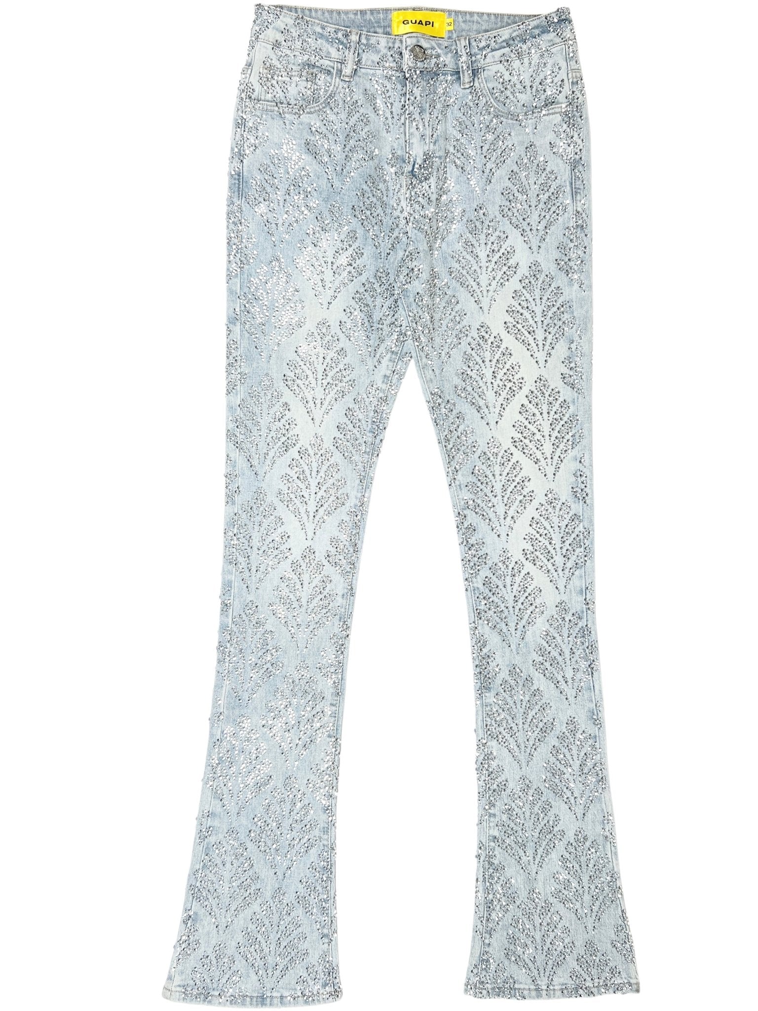 Explore the elegance of GUAPI with the Aqua Blue Embellished Denim V2. These light blue flared jeans feature a silver leaf pattern and a yellow brand tag on the waistband, effortlessly blending sophistication and style for any wardrobe.