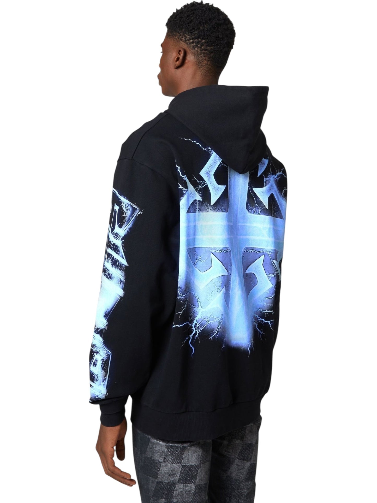 A person wears the GUAPI Guapi Black Revived Hoodie V2 featuring blue electric graphics on the back and sleeve, standing against a white background.