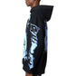 A person stands in profile wearing the GUAPI Black Revived Hoodie V2, a streetwear piece featuring striking blue and white graphic designs on the sleeves and back.