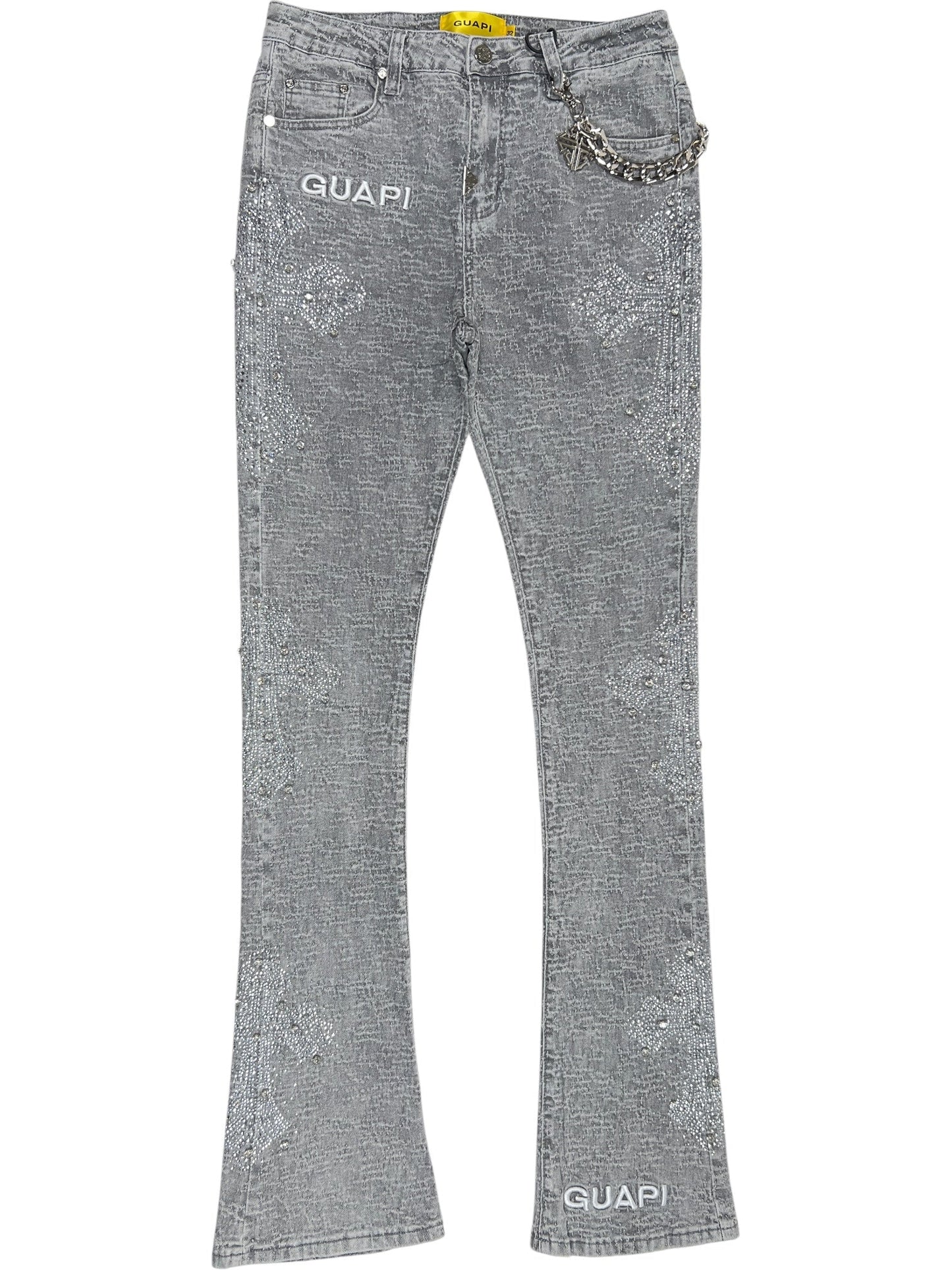 Guapi Smoke Grey Distressed Cross Denim jeans by GUAPI feature a gray, textured straight-leg fit with "GUAPI" branding on the right leg and left pocket, plus a decorative chain on the belt loop.