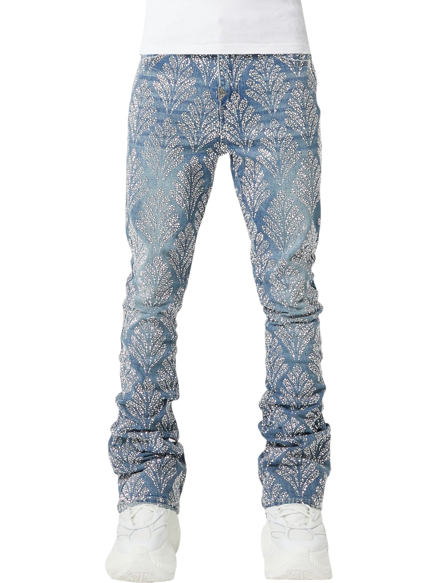 Someone wears the GUAPI Steel Blue Embellished Denim V2 jeans featuring a white leaf pattern, paired with a white shirt and white sneakers.