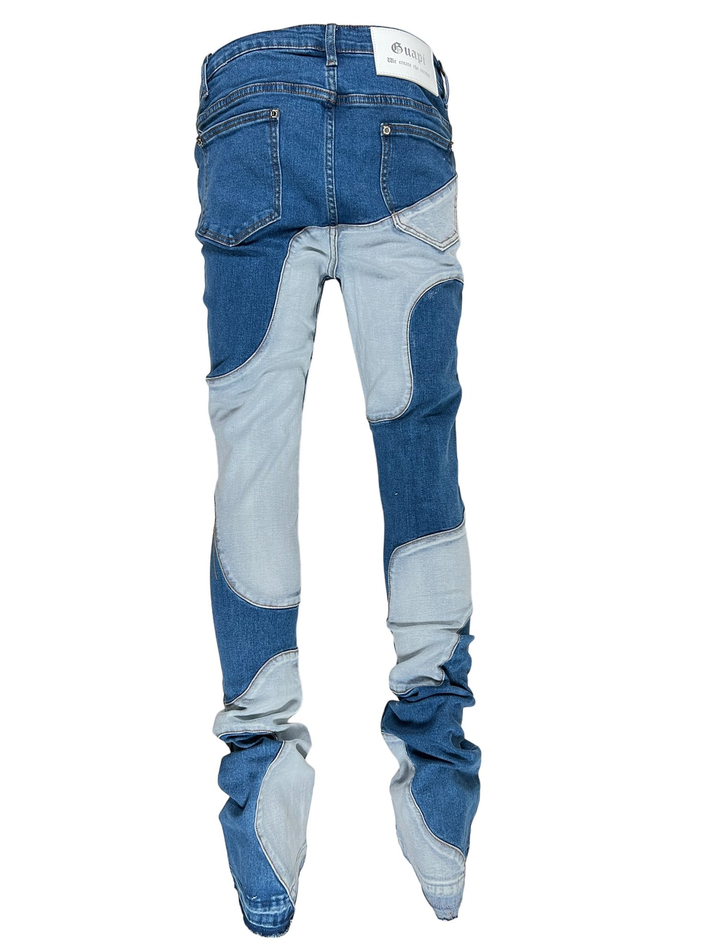 GUAPI VINTAGE BLUE WAVY DENIM jeans with white stitching, patches, and a perfect fit displayed against a white background.