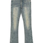 A pair of GUAPI Guapi Vintage Olive Pearls Denim jeans with a flared cut, faded wash, and white and green paint splatter details on the front legs.