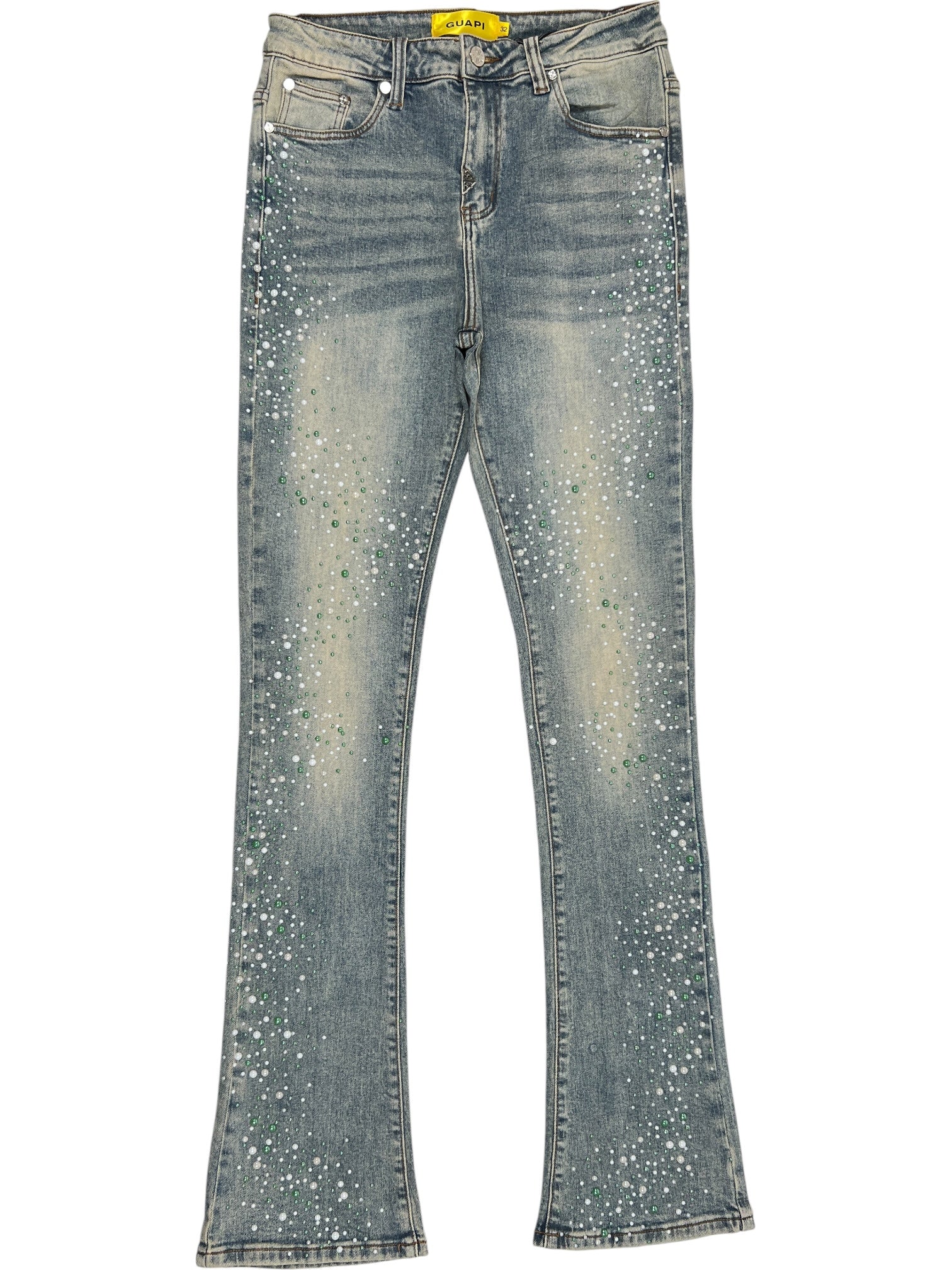A pair of GUAPI Guapi Vintage Olive Pearls Denim jeans with a flared cut, faded wash, and white and green paint splatter details on the front legs.
