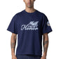 A man wears the HONOR THE GIFT Auto Club Box Tee Navy, a standard fit 100% cotton t-shirt featuring "The Gift Honor" with front graphic and "Honor" chain stitch embroidery on the left sleeve.