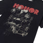 The Honor The Gift Block Party T-shirt in black features bold red "HONOR" text and a lively graphic of palm trees, speakers, a house, and an ice cream truck. Made from 100% cotton for comfort, it captures the block party vibe.