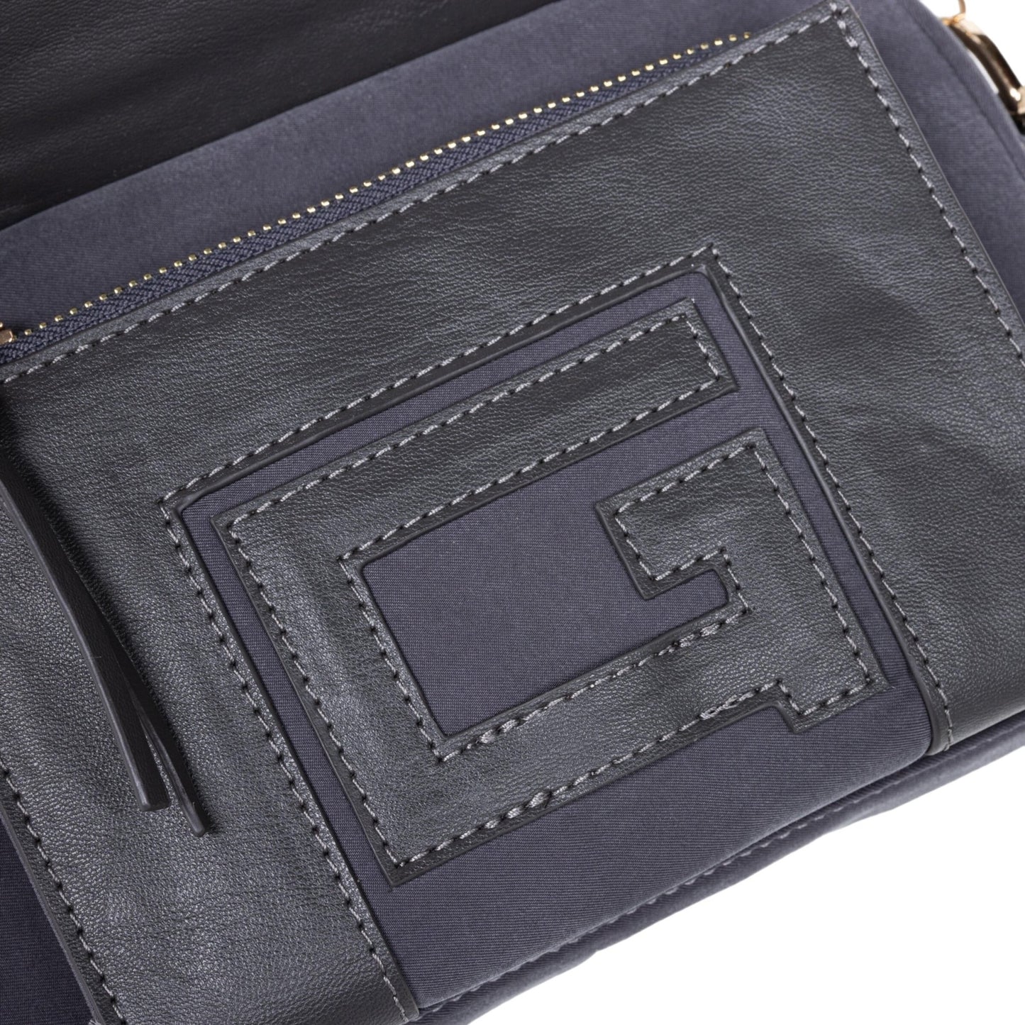 Close-up of the HONOR THE GIFT HTG SIDE BAG DARK GREY faux leather wallet, featuring a prominent, sewn letter "G" design on its front surface.