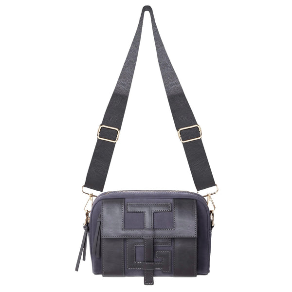 A chic dark grey faux leather crossbody bag from HONOR THE GIFT, featuring an adjustable strap, a bold "T" letter design on the front, and a sleek "H" logo closure for added elegance.