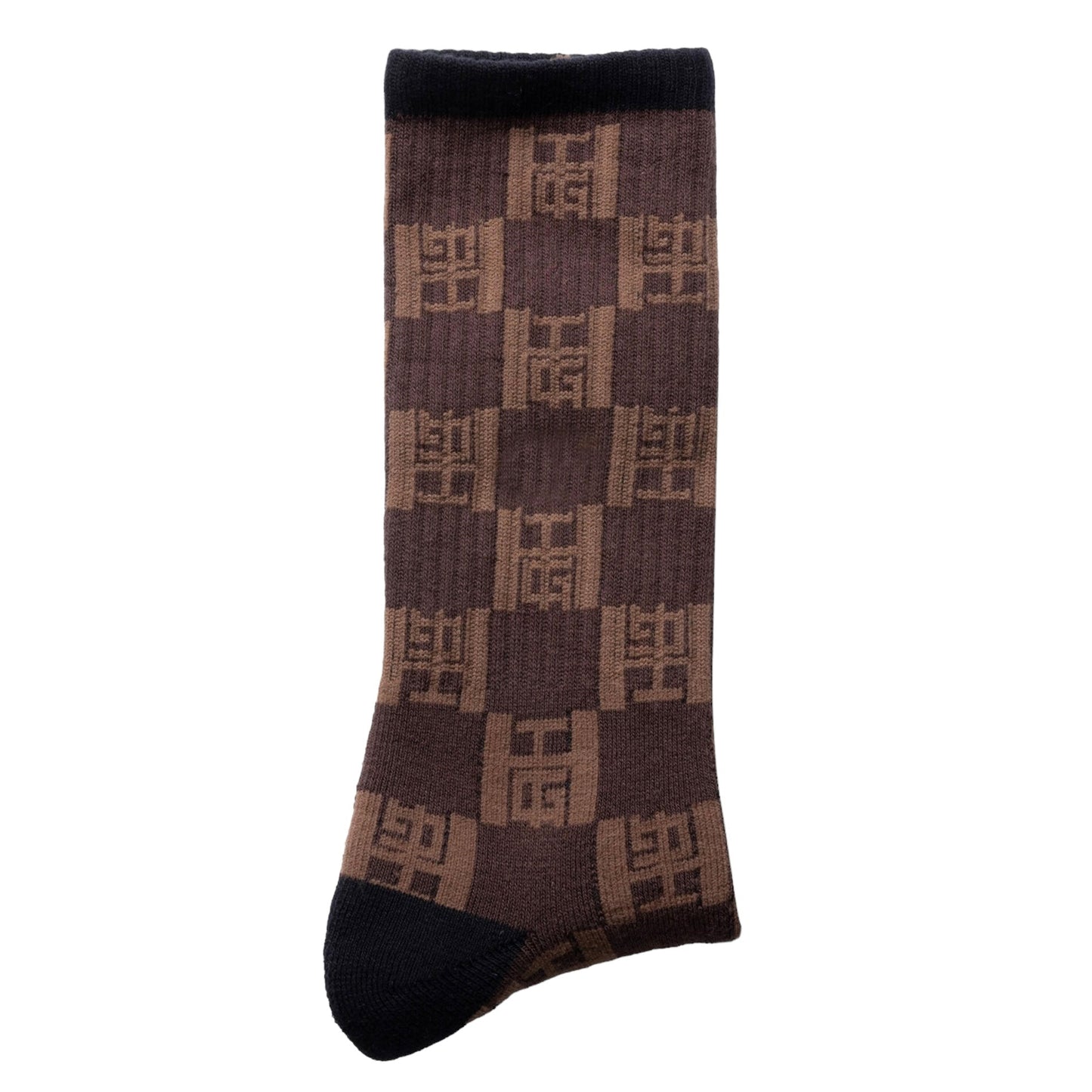 Single brown and black ribbed sock with a patterned design featuring repeating geometric shapes and the HONOR THE GIFT monogram logo. Product Name: HONOR THE GIFT MONOGRAM RIBBED SOCK BROWN by HONOR THE GIFT.