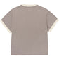 The HONOR THE GIFT Multi Box Tee Stone is a heavyweight taupe cotton t-shirt with white trim on the collar and cuffs, shown from the back for a durable, timeless look.