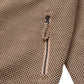 Close-up of the Honor The Gift Novelty Knit Track Jacket in brown by HONOR THE GIFT, showcasing its tan and black checkered fabric, zip front closure, and loop detail.