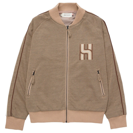 Honor The Gift Novelty Knit Track Jacket in brown, featuring a textured pattern and a flat embroidery "H" logo on the left chest. Designed by HONOR THE GIFT, it includes a zip front closure, side pockets, and ribbed cuffs and collar.