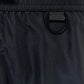 Close-up of ICEBERG ICE25MBM01 Medium Boardshort Black, crafted from black polyester with an elastic waistband and a black D-ring detail below the waist, inspired by classic Iceberg swim trunk styles.