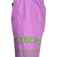 The ICEBERG ICE25MBM01 medium boardshort in raspberry features polyester fabric and "ICEBERG MILANO ITALIA since 1974" printed in green on the left leg.