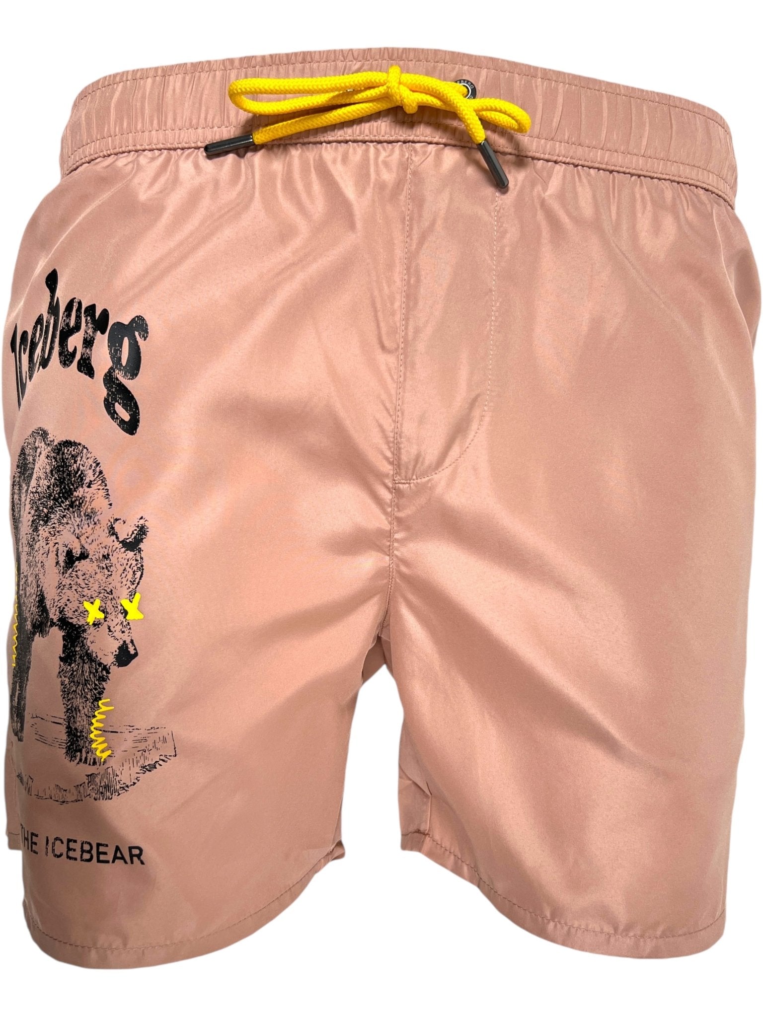 The ICEBERG ICE25MBS03 Short Boardshort Blush is a light pink 100% polyester swim trunk featuring a yellow drawstring, bear graphic with yellow eyes, and "Iceberg" and "The Icebear" text on the left leg. Imported for quality and comfort.
