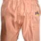 The ICEBERG ICE25MBS03 Short Boardshort Blush features a peach hue, 100% polyester satin fabric, an elastic waistband, right back pocket, and "Iceberg" embroidery above the pocket.