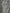 Close-up of the textured polyester fabric from the Iceberg ICE25MBS05 Short Boardshort Black, featuring a repeated "ICEBERG" logo and mountain outline in monochrome, by ICEBERG.