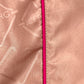 Close-up of blush pink polyester fabric from the ICEBERG ICE25MBS05 Short Boardshort, featuring a darker pink vertical seam and a subtle repeating "ICEBERG" logo pattern on the left side.
