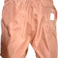 The ICEBERG ICE25MBS05 Short Boardshort in blush features light brown polyester, a subtle repeating pattern, elastic waistband, and a back pocket with a white ICEBERG label.