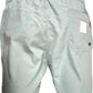 The Iceberg ICE25MBS05 Short Boardshort Mint by ICEBERG is made from 100% polyester, featuring an elastic waistband, back pocket with white label, and subtle logo patterns throughout. Imported for quality and style.