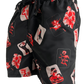 A KSUBI ICONS BOARDSHORT BLACK with a floral print.