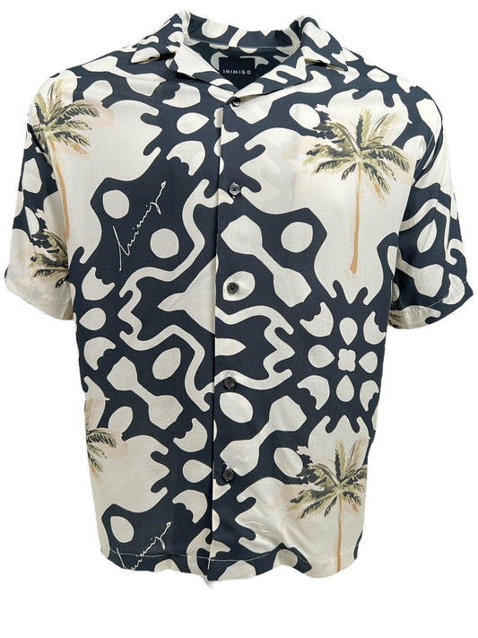 Part of the INIMIGO collection, this short-sleeve button-up shirt boasts a black and white abstract pattern with palm tree motifs. The INIMIGO ISH3525 PALM SHIRT BLACK embodies a laid-back tropical vibe.