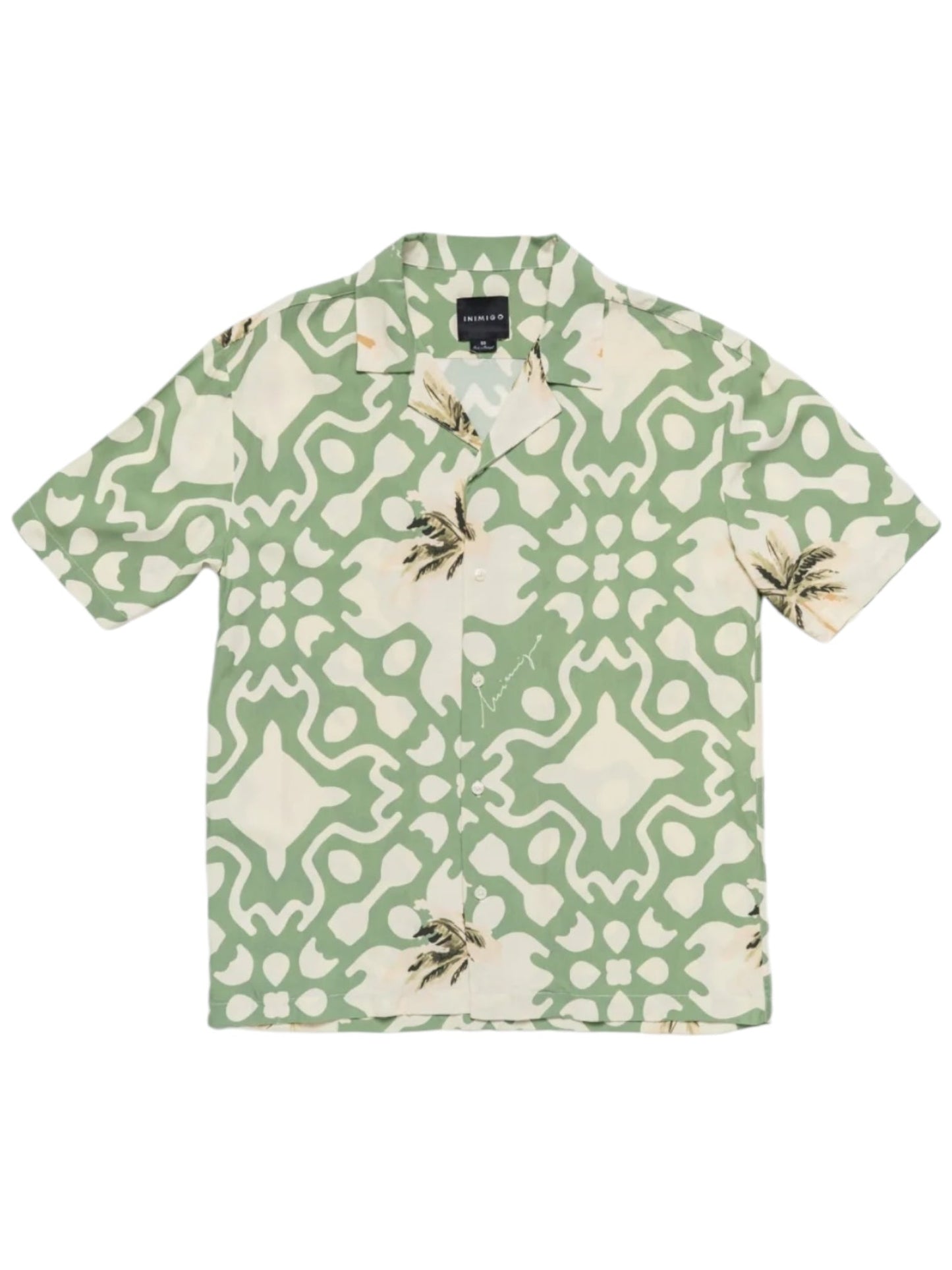 The INIMIGO Inimigo ISH3525 Palm Shirt in green is a short-sleeve button-up that showcases a bold white and beige abstract pattern with floral details, making it perfect for any summer outing.