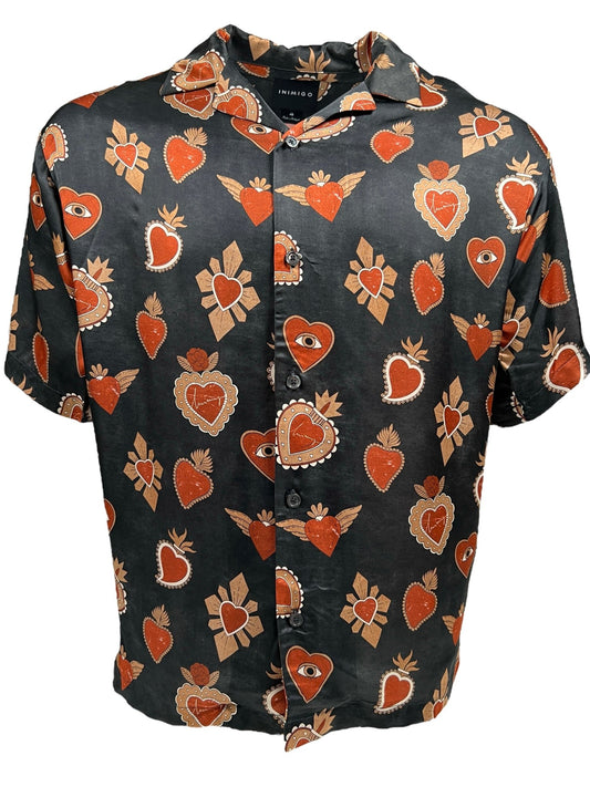 INIMIGO INIMIGO ISH3527 MEXICAN HEARTS SHIRT BLACK with a black base and red and gold designs featuring hearts, eyes, and decorative motifs, reminiscent of a tropical print shirt.